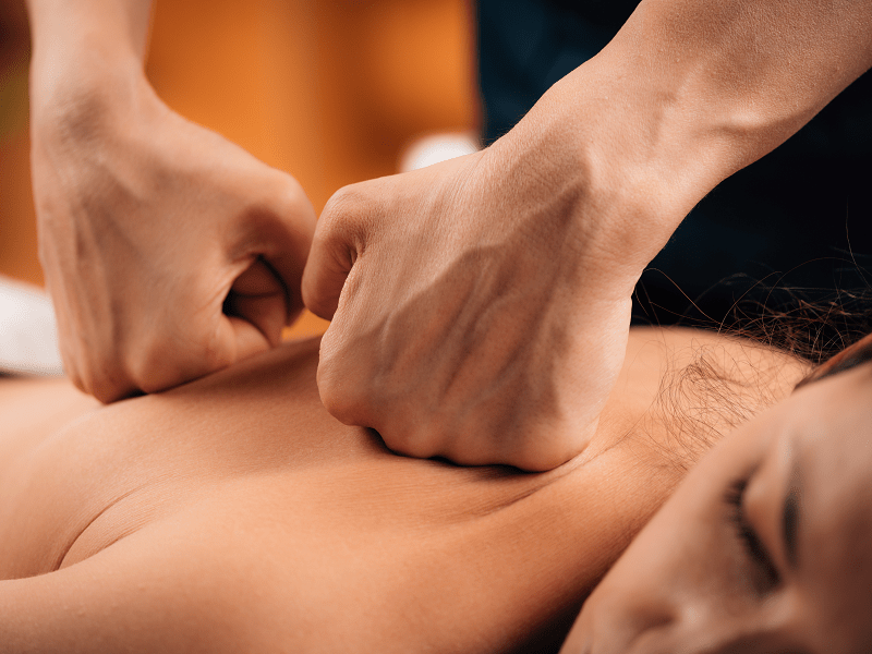 A woman getting a deep tissue massage in Las Vegas